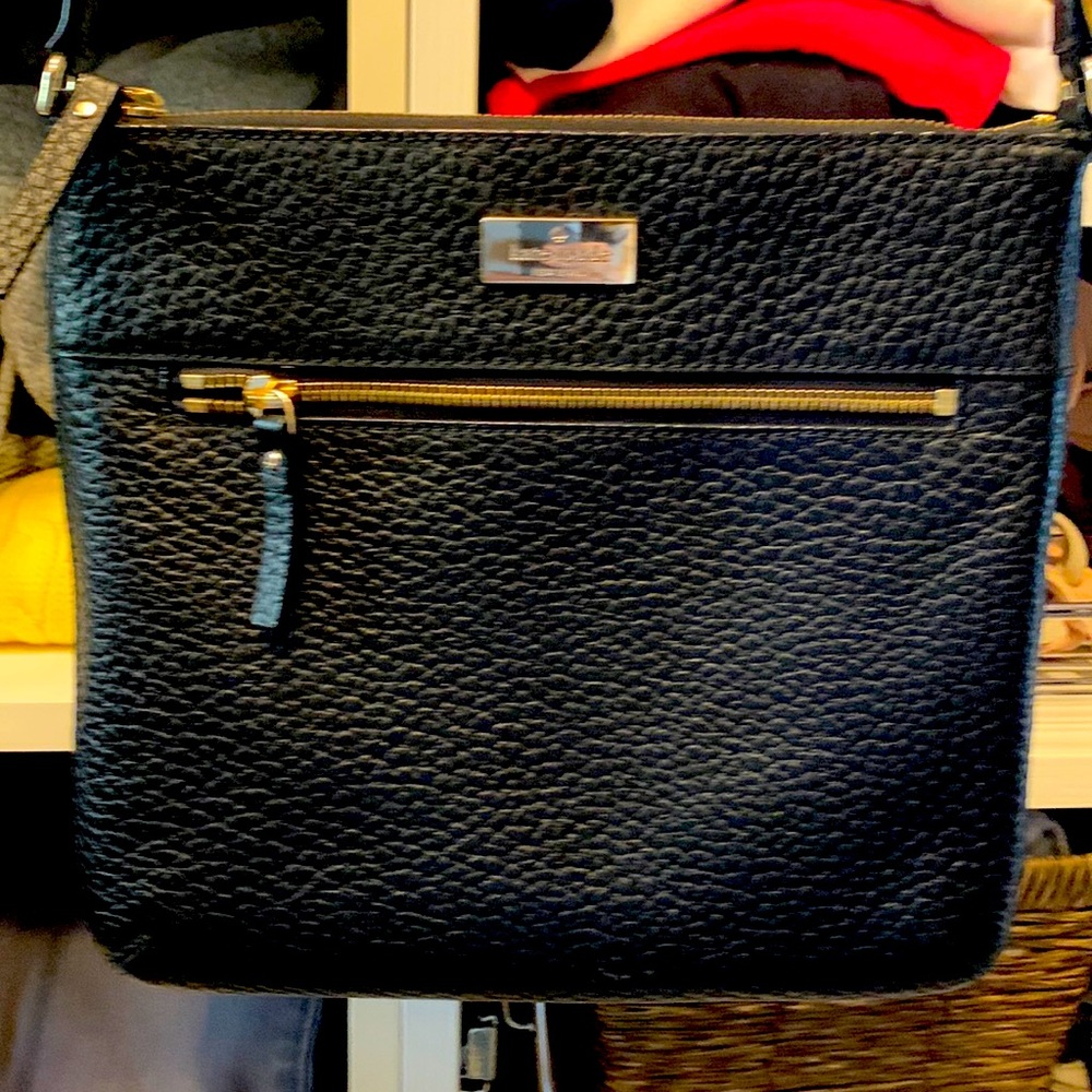Kate Spade’s black Crossbody purse. Great condition!